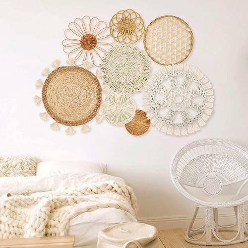 Boho-style wall decor with woven baskets and patterns above a cozy bed and chair.