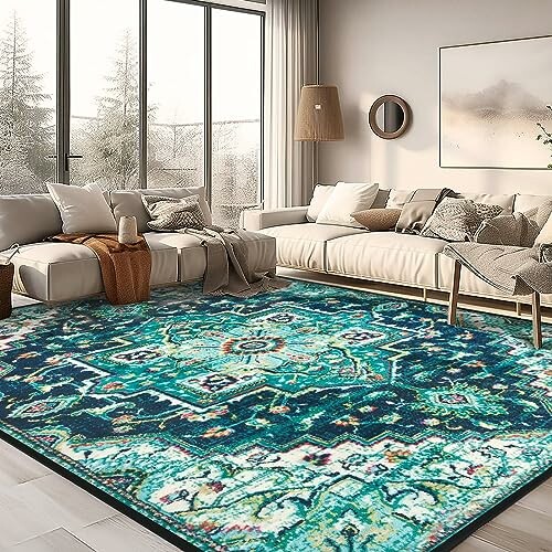 Modern living room with a turquoise patterned rug and beige furniture.